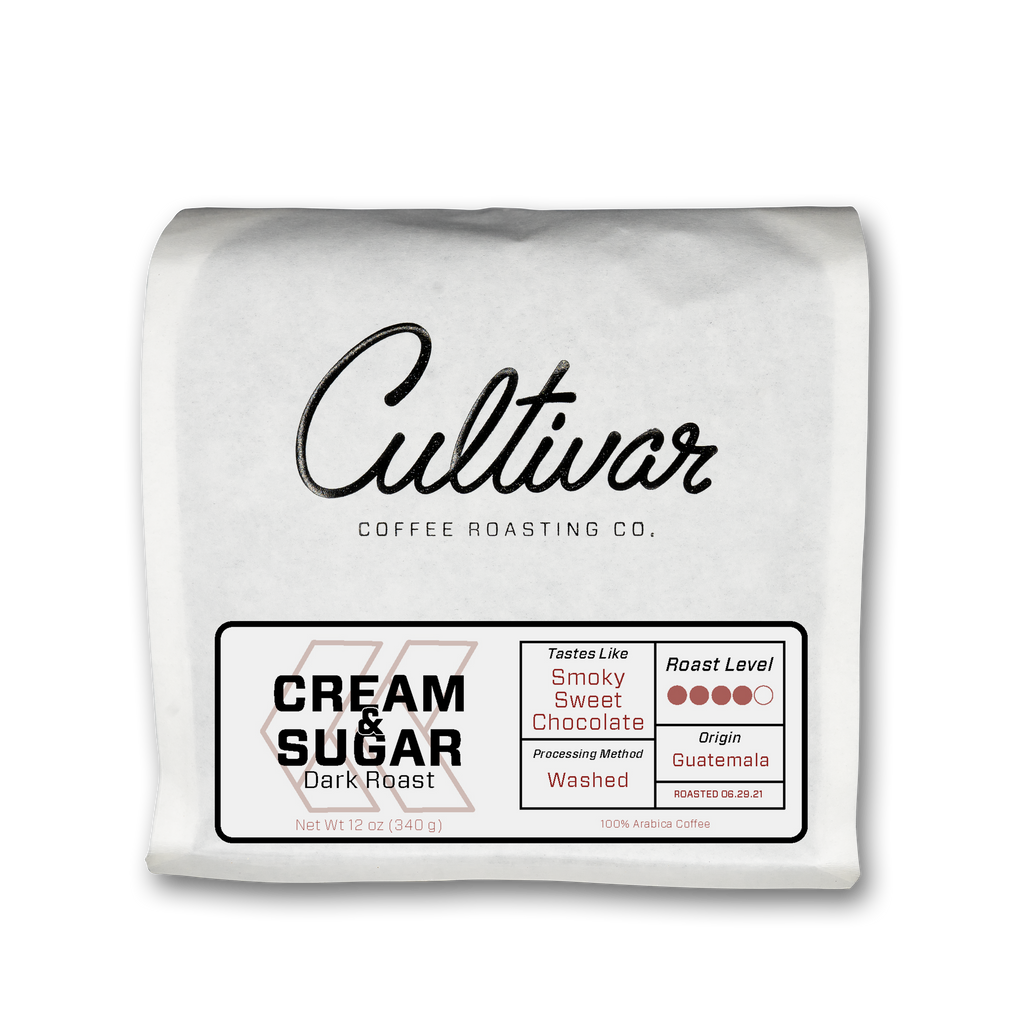 Bag of Cultivar's Cream & Sugar Dark Roast roasted coffee beans